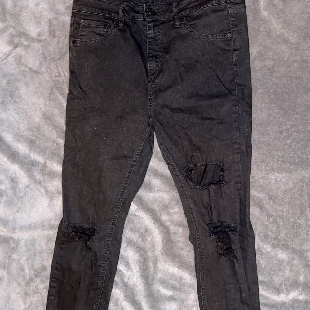 black ripped jeans
